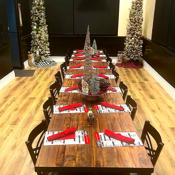 A long table set for a holiday party